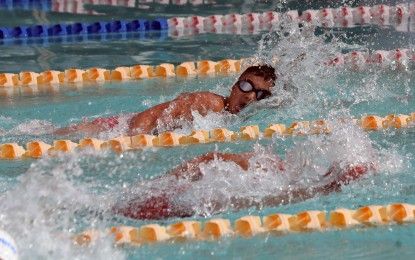 <p><strong>5TH GOLD MEDAL.</strong> National Capital Region's Titus Rafael Sia competes in the elementary boys' 100-meter backstroke in the 65th Palarong Pambansa at the Ferdinand E. Marcos Sr. Memorial Stadium pool in Laoag City, Ilocos Norte on Tuesday (May 28, 2025). He won the event with a new meet record of 1:05.44. <em>(PNA photo by Yancy Lim)</em></p>