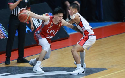 <p><strong>PIRATES WIN. </strong>Lyceum of the Philippines University's Renz Villegas (No. 20) tries to get past Letran's James Miller (No. 2) during the National Collegiate Athletic Association (NCAA) Season 100 men's basketball tournament at the Filoil EcoOil Arena in San Juan on Friday (Oct. 11, 2024). Villegas scored 23 points as the Pirates won the game, 91-68. <em>(NCAA photo) </em></p>